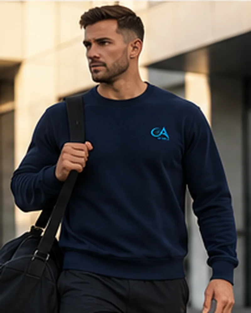 Homme en sweat GA, sac de sport à l'épaule